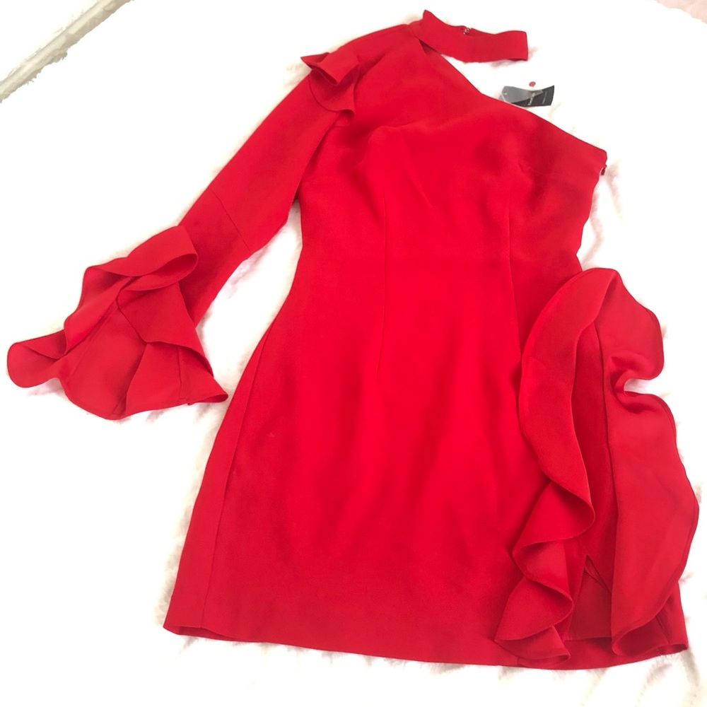 Cocktail short Red dress one arm details in the sleeve  open shirt one corner